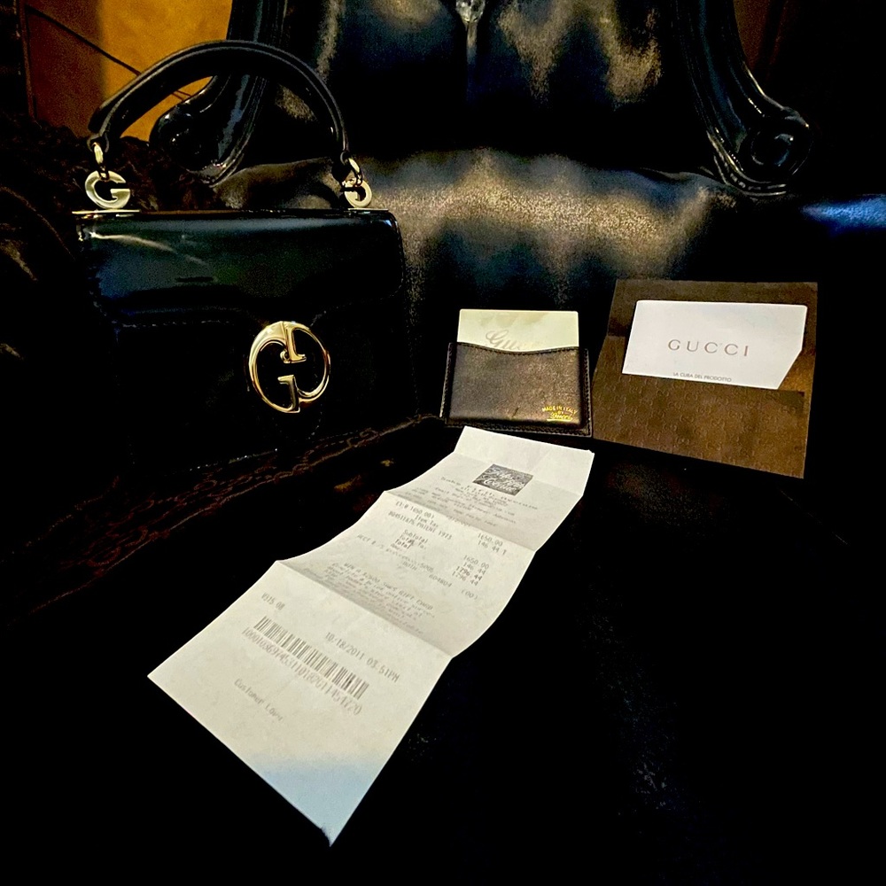New Rare Gucci Handbag in Black Patent Leather.